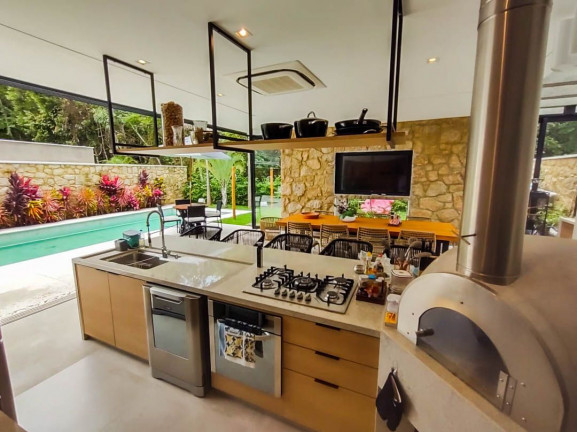 Imagem Casa de Condomínio com 6 Quartos à Venda,  em Riviera - Bertioga