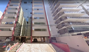 Imagem de fundo do condomínio Condomínio Centro Empresarial Comendador Antônio - Vardasca - Guarujá - SP