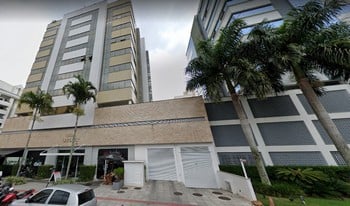 Imagem de fundo do condomínio Condomínio Centro Empresarial Isola Sarezzo - Itacorubi - Florianópolis - SC