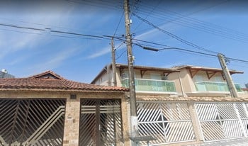 Imagem de fundo do condomínio Condomínio Conjunto Res. Santa Rita - Real - Praia Grande - SP