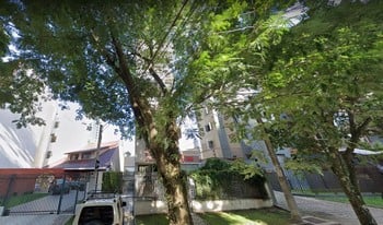 Imagem de fundo do condomínio Condomínio Surya - Alto Da Glória - Curitiba - PR