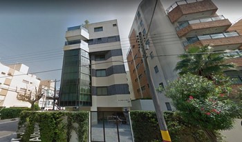 Imagem de fundo do condomínio Condomínio Toa Toa - Enseada - Guarujá - SP