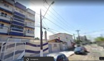 Imagem de fundo do condomínio Condomínio Residêncial Búzios - Vila Mirim - Praia Grande - SP