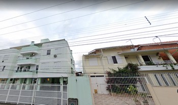 Imagem de fundo do condomínio Condomínio Residêncial João Carlos Bordini Grigoletti - Canasvieiras - Florianópolis - SC