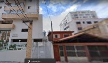 Imagem de fundo do condomínio Condomínio Residêncial Lisboa - Ocian - Praia Grande - SP