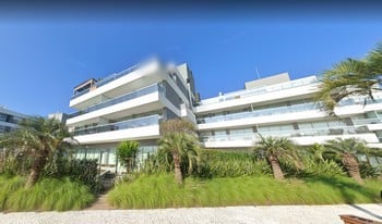Imagem de fundo do condomínio Condomínio Residêncial Quay - Jurerê Internacional - Florianópolis - SC