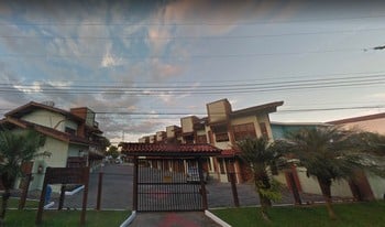 Imagem de fundo do condomínio Condomínio Villagio Porto Feliz - Praia Das Toninhas - Ubatuba - SP