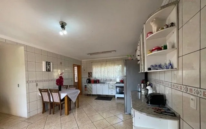 Imagem Casa com 4 Quartos à Venda, 473 m² em Lucas Araújo - Passo Fundo