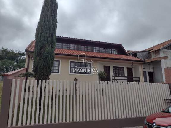 Imagem Casa com 3 Quartos à Venda, 230 m²em Bacacheri - Curitiba