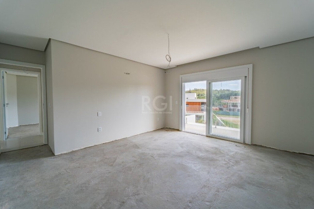 Foto do imóvel Casa de Condomínio com 3 Quartos à Venda, 300 m² em Vila Nova - Porto Alegre