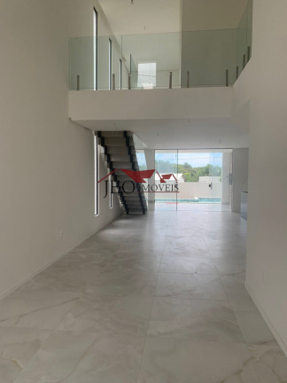 Imagem Casa de Condomínio com 4 Quartos à Venda, 200 m²