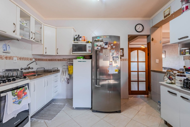 Foto do imóvel Casa de Condomínio com 4 Quartos à Venda, 202 m² em Ipanema - Porto Alegre