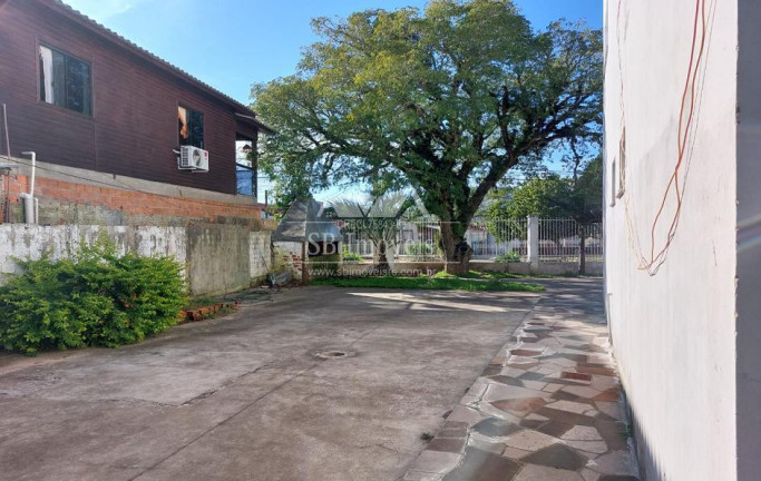Imagem Casa com 3 Quartos à Venda, 360 m² em Guarujá - Porto Alegre