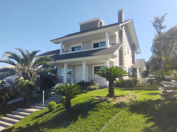 Foto do imóvel Casa de Condomínio com 3 Quartos à Venda, 349 m² em Cacupé - Florianópolis