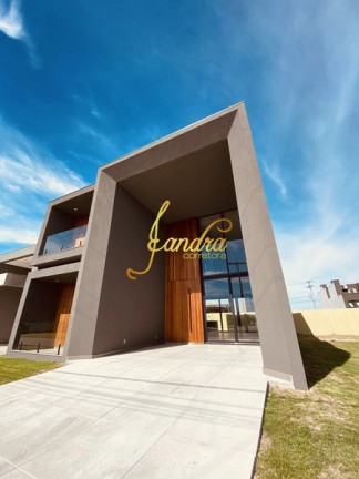 Imagem Casa de Condomínio com 4 Quartos à Venda, 231 m² em Centro - Xangri-la