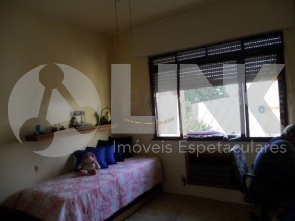 Imagem Casa com 4 Quartos à Venda, 318 m² em Três Figueiras - Porto Alegre