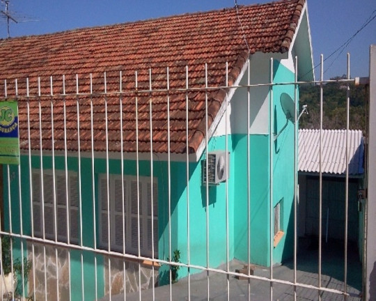 Imagem Casa com 4 Quartos à Venda, 240 m² em Santa Tereza - Porto Alegre