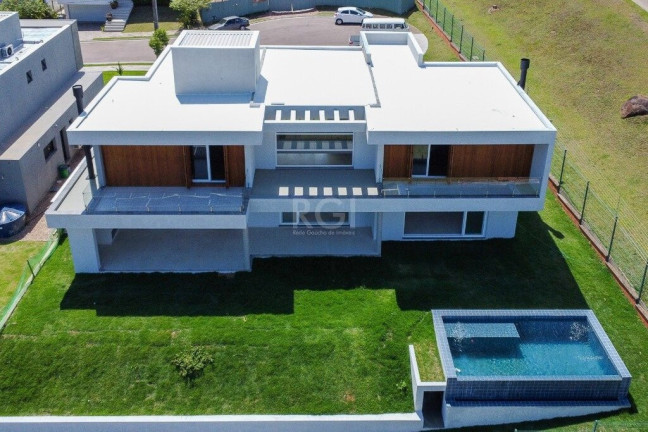 Foto do imóvel Casa com 4 Quartos à Venda,  em Vila Nova - Porto Alegre