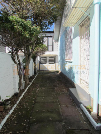 Imagem Casa com 5 Quartos à Venda, 320 m² em Santa Tereza - Porto Alegre