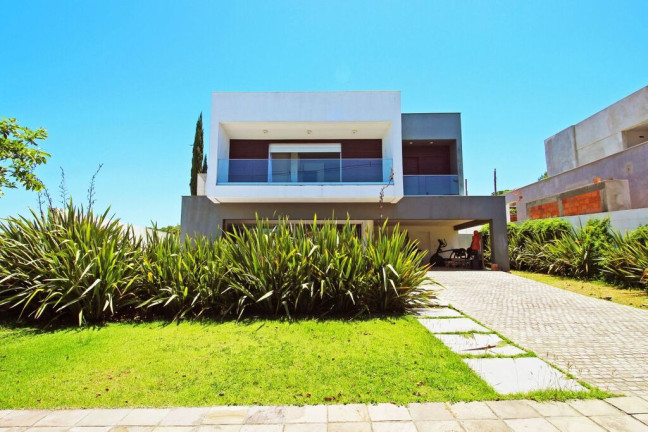 Foto do imóvel Casa de Condomínio com 4 Quartos à Venda, 341 m² em Vila Nova - Porto Alegre