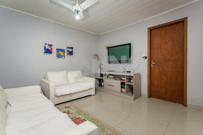 Imagem Casa com 3 Quartos à Venda, 140 m² em Passo Da Areia - Porto Alegre