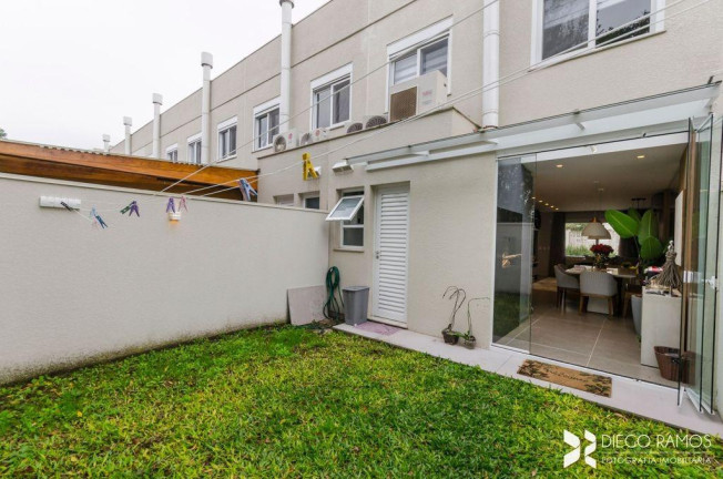 Imagem Casa de Condomínio com 3 Quartos à Venda, 120 m² em Vila Nova - Porto Alegre