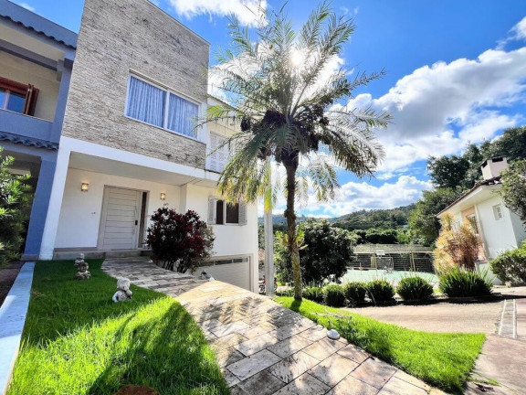 Foto do imóvel Casa com 3 Quartos à Venda, 300 m² em Vila Nova - Porto Alegre